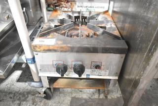 L&J OWST-018-2 stainless steel commercial single burner stock pot range, natural gas powered, visible wear, 106 label.