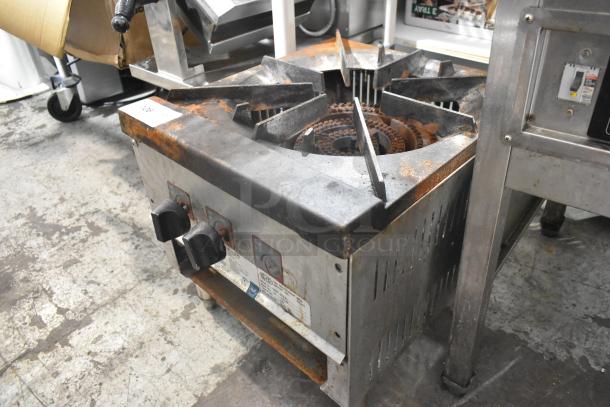 L&J OWST-018-2 stainless steel natural gas single burner stock pot range. Used, with visible rust and wear.