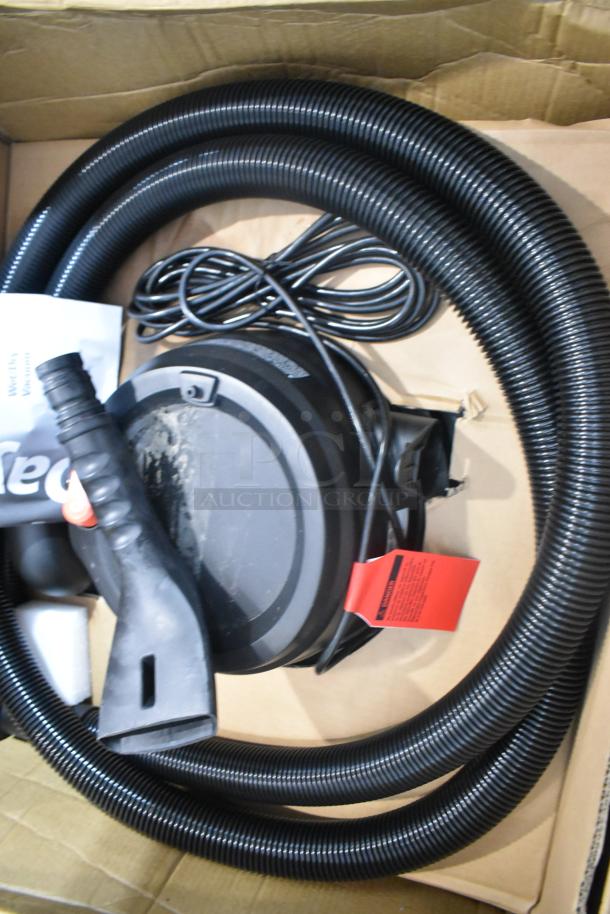 Dayton 61HV93 Drum Head, 120 Volts, 1 Phase, shown with black hose and power cord, in good condition.