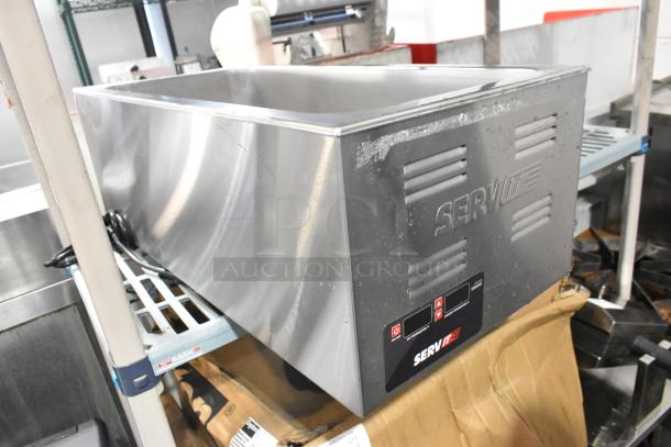 Brand new ServIt 423FW150L stainless steel commercial countertop food warmer, 2024 model, 120V, 1 phase, minor scratches.
