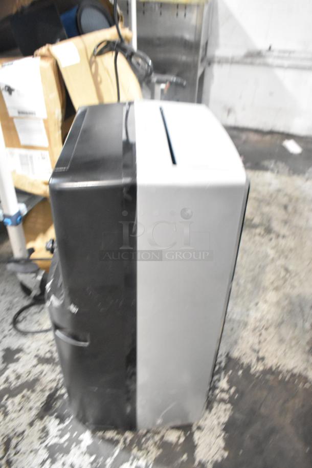 Honeywell MN10CES Portable Air Conditioner, 115V, clean condition, black and silver finish, visible power cord.