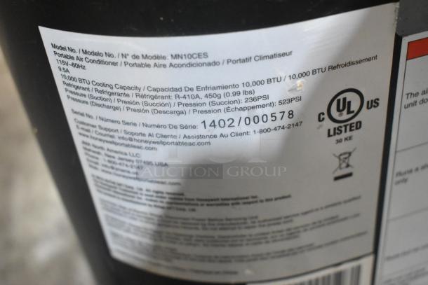 Honeywell MN10CES Portable Air Conditioner, 115 Volts, 10,000 BTU, model label visible with specifications and serial number.