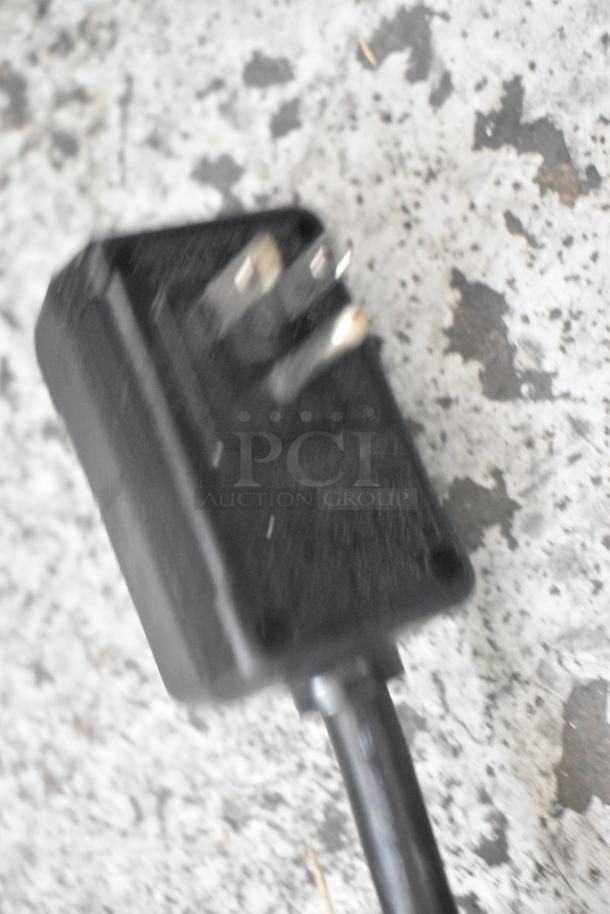 Close-up of a three-prong plug for a Honeywell MN10CES Portable Air Conditioner. 115 volts, 1 phase.