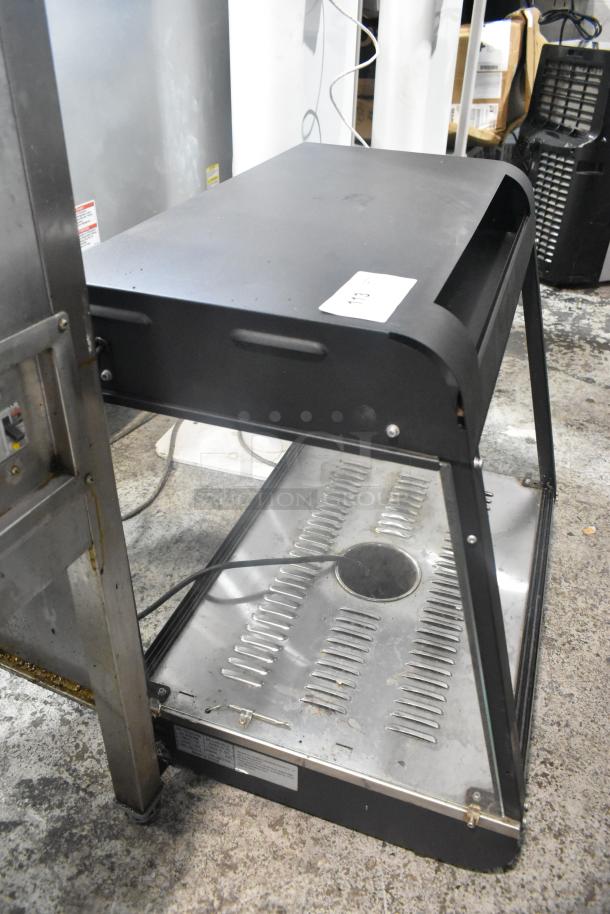 2022 Metal Commercial Countertop Heated Display Case, 110 Volts, 1 Phase, black finish, used condition.