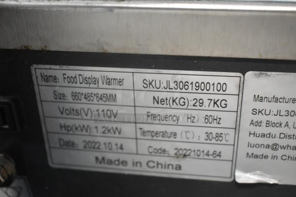 2022 Metal Countertop Heated Display Case, 110V, 1 Phase. Label shows SKU, dimensions 660x485x645mm, 1.2kW power.