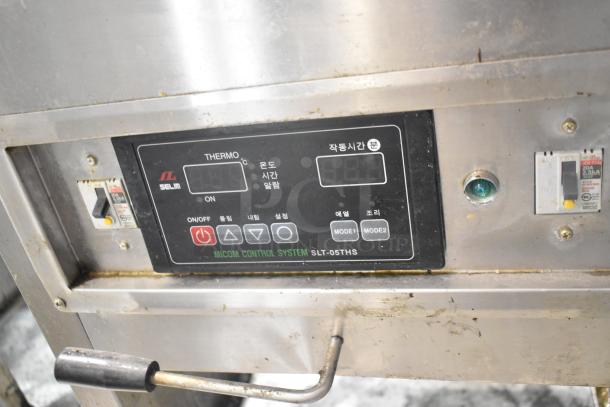 Selm SLT-05THS stainless steel commercial steam table control panel, showing buttons, switches, and model label.