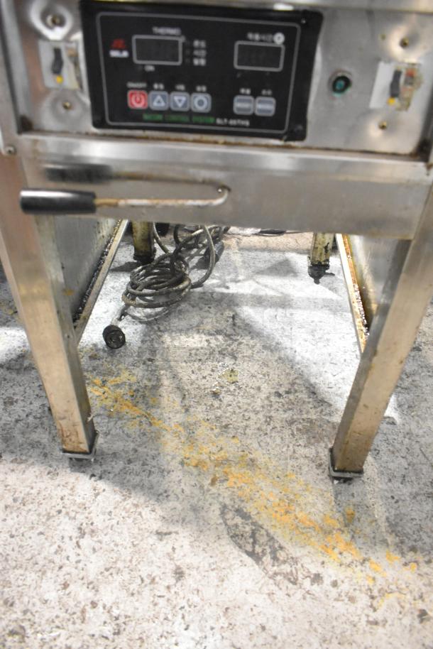 Selm SLT-05THS Stainless Steel Single Bay Steam Table with control panel, visible wear, and attached wiring.