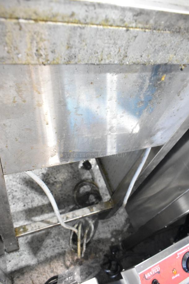 Selm SLT-05THS Stainless Steel Single Bay Steam Table, showing signs of use. Features durable construction.