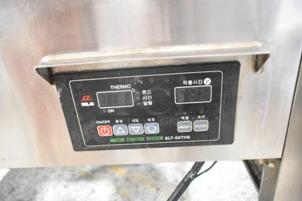 Selm SLT-05THS electric steam table with control panel, stainless steel, commercial use, visible settings and indicators.