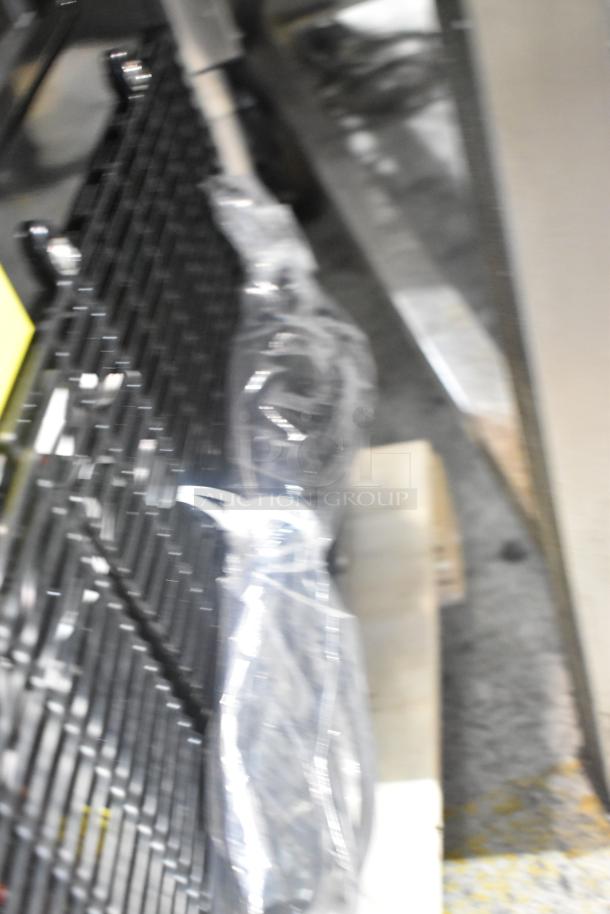 Blurred image of Avantco 19BC48HCB refrigerated bakery display case packaging, including metal grate visible.