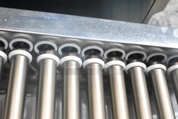 2024 Avantco 177RG1850NS stainless steel hot dog roller grill, 11 non-stick rollers, 120V, new scratch and dent condition.