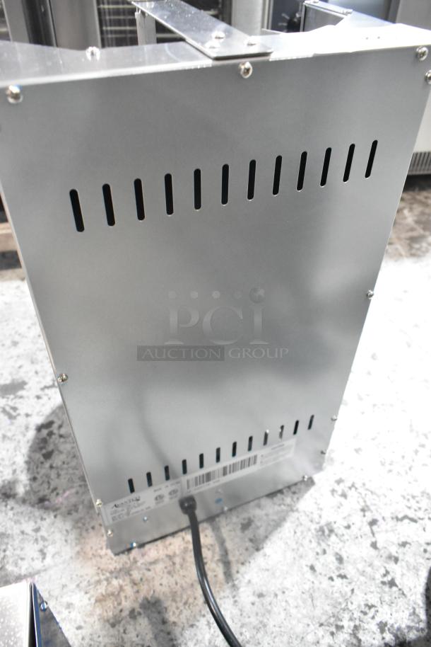 Brand new Avantco 177VBE101A stainless steel electric vertical broiler, 20 lb. capacity, 120V, showing vented back panel.