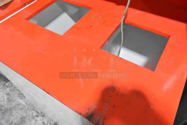 White and red double trash can shell, GMPack 3 Series Q-23, used condition, dual openings, visible wear and surface marks.