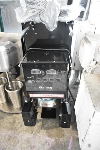 BRAND NEW 2024 Galaxy 177CSFA Cup Sealing Machine, scratch and dent condition, 88-95 mm, 110V, 1 Phase, with caution label.