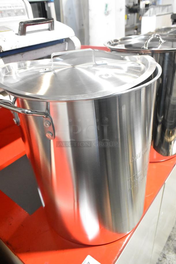 Brand new stainless steel deep fat fryer stock pots. Minor scratches and dents. Comes with sturdy lids and handles.