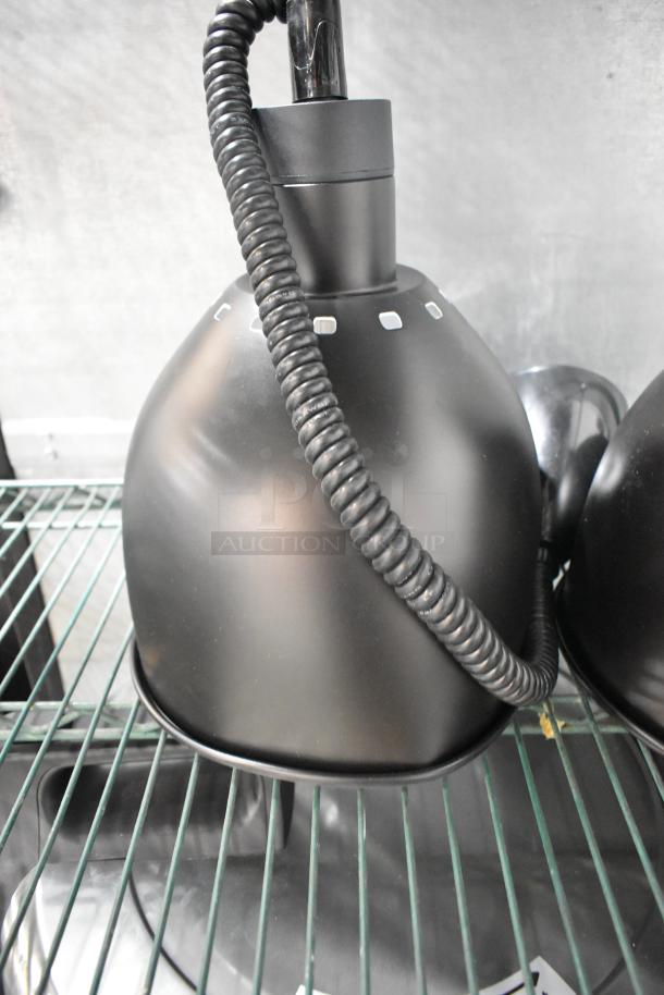 Brand new ServIt 423HLR85BK heat lamp, retractable cord, modern black dome shade, 120V, 1 phase, minor scratches.