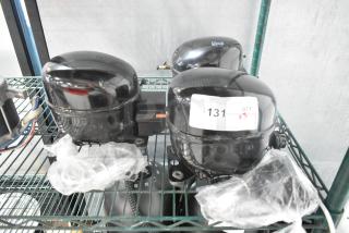 Three brand new scratch and dent compressors, models Cubigel NUT45NR, NUT70NR, Embraco EMC3140U, all for Avantco units; labeled "131 QTY x3".