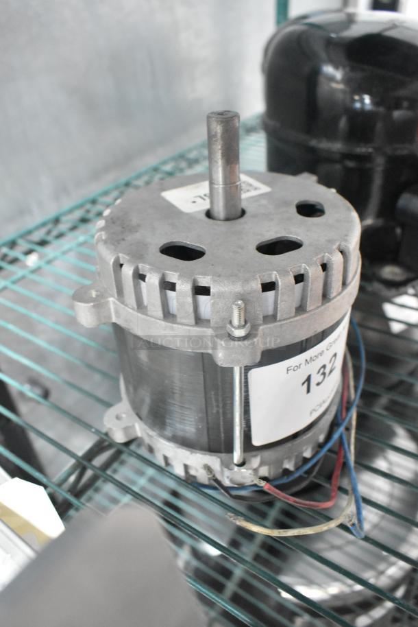 Brand new D0250-6 motor, 120V, 1 Phase, with visible scratch and dent. Tags indicate model and specifications.