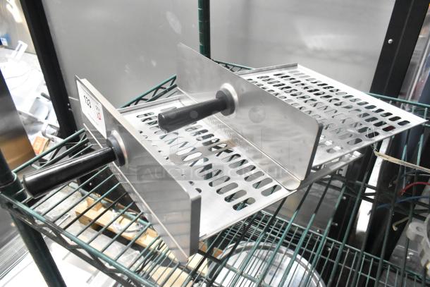 2 Antunes 7002880 replacement spatulas, scratch and dent, metal construction, black handles, auction label visible.