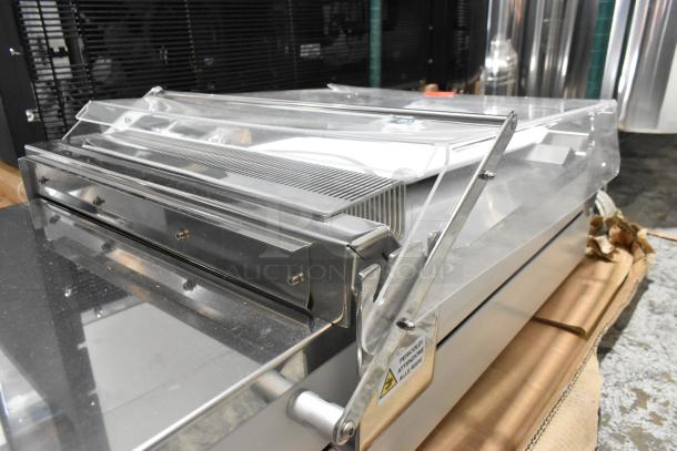 BRAND NEW Pavoni LIRA/E110V semi-automatic dessert slicer. 110 volts, 1 phase. Scratch and dent condition.