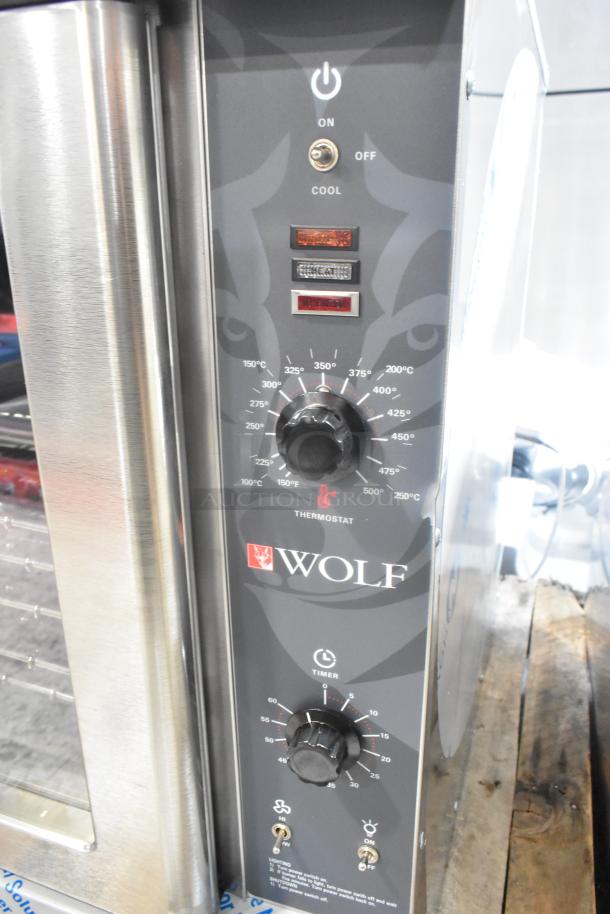 BRAND NEW Wolf WC4GD-21D3 stainless steel LP convection oven with view-through doors, metal racks, and thermostatic controls. 50,000 BTU.