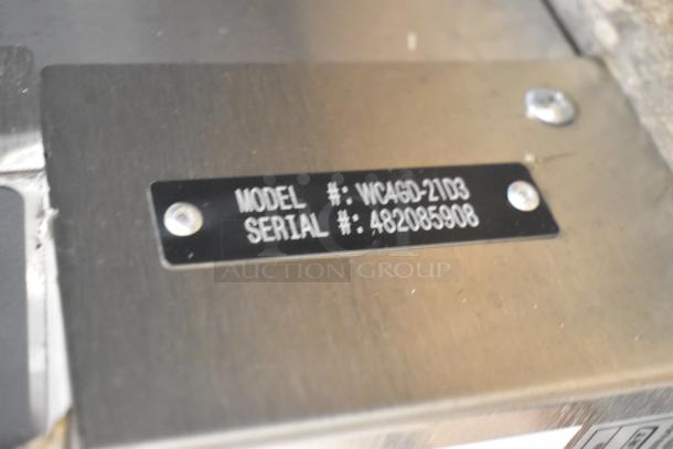 Model plate on Wolf WC4GD-21D3 convection oven showing model and serial numbers.