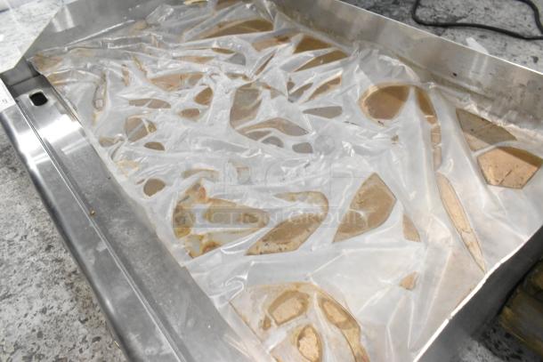 Brand new Avantco 177EG30N 30" electric countertop griddle. Stainless steel, 208/240 volts, 1 phase, with visible scratches.