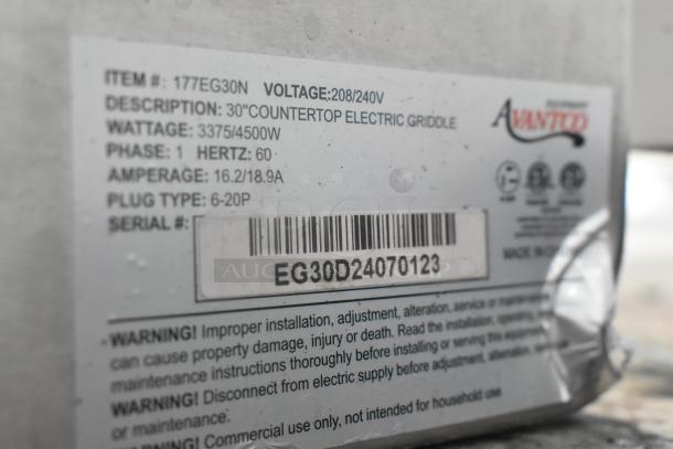 Alt Text: Label on Avantco 177EG30N 30" stainless steel electric countertop griddle, showing specs and serial number.