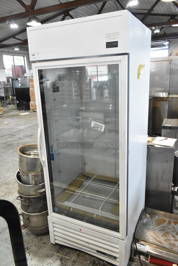 Brand new True Metal commercial single door reach-in cooler with poly-coated racks. Scratch and dent. 115 volts, 1 phase.
