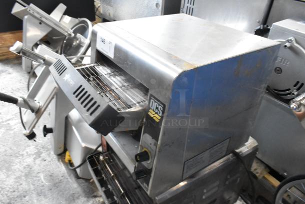 Star Holman QCS-1-350 stainless steel conveyor toaster oven in fair condition, 120 volts, 1 phase visible on label.
