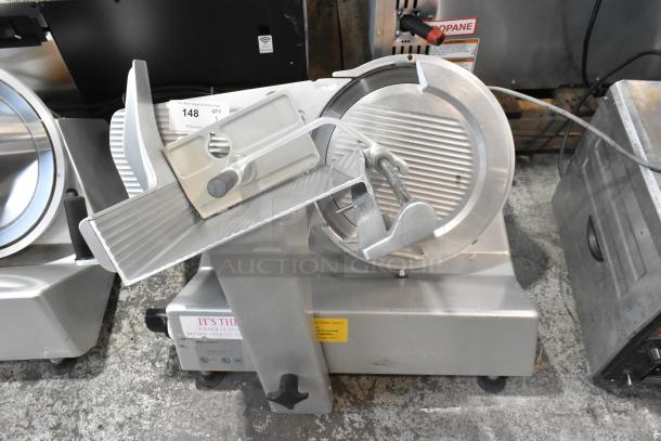 Bizerba GSP metal meat slicer, commercial countertop model, 115 volts, 1 phase, used condition, visible control dials.