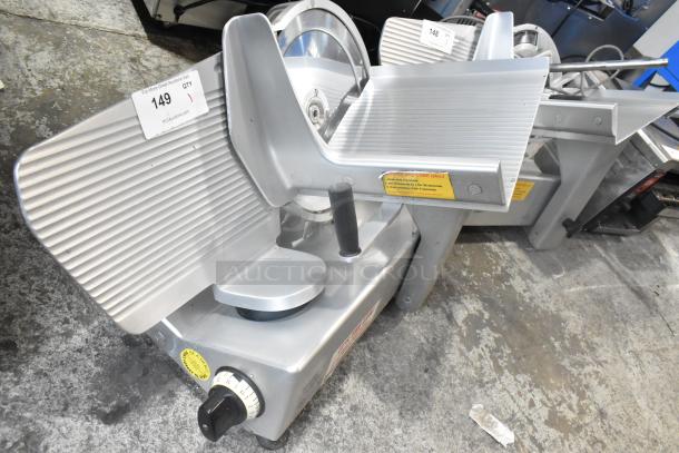 Bizerba SE 12 US commercial meat slicer, metal, 115 volts, 1 phase, with adjustment knob and safety labels.