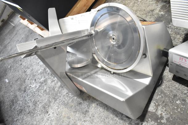 Bizerba SE 12 US commercial metal meat slicer, 115 volts, 1 phase, visible wear, stainless steel construction.