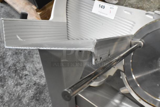 Bizerba SE 12 US metal commercial meat slicer, 115 volts, 1 phase, in used condition, visible auction label.