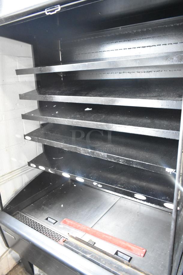 Master Bilt black open air grab n go merchandiser, metal shelves, 115 volts, 1 phase, used condition.