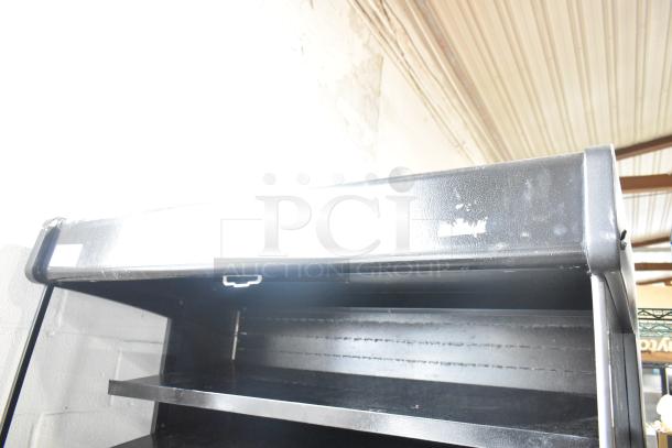 Master Bilt black metal open-air grab-n-go merchandiser, 115V, 1 phase, features multiple shelves, good condition.