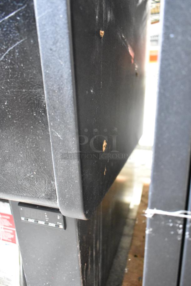 Master Bilt black open-air grab-n-go merchandiser, metal exterior, visible scratches, 115 volts, 1 phase, control panel.