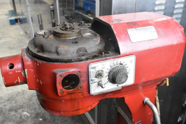 Hobart A-200 20 Quart Planetary Dough Mixer, red, shows wear with rust and paint chipping, visible speed dial and controls.