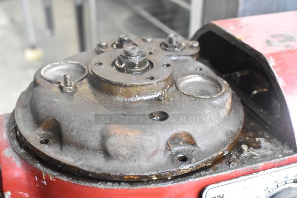 Hobart A-200 planetary dough mixer, metal construction, visible wear, base detail shown, commercial use. Model A-200.