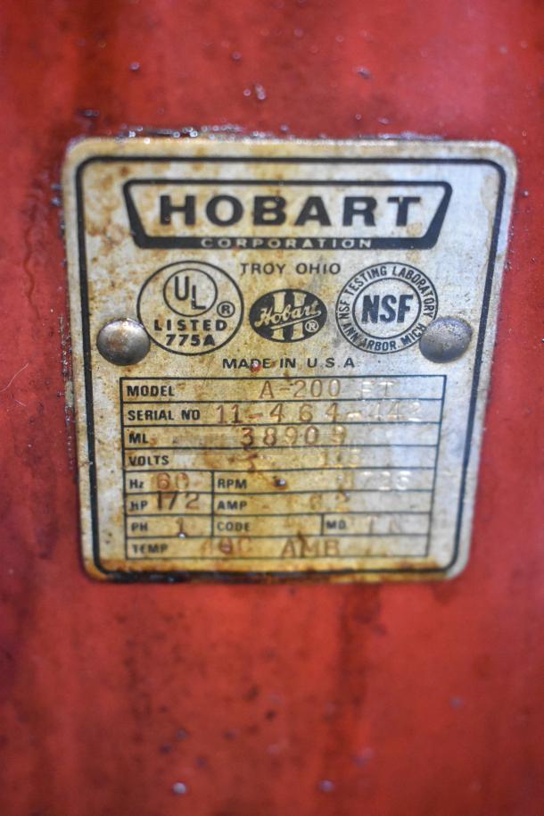 Hobart A-200 commercial dough mixer, 20-quart, metal build, includes original model label with specifications.
