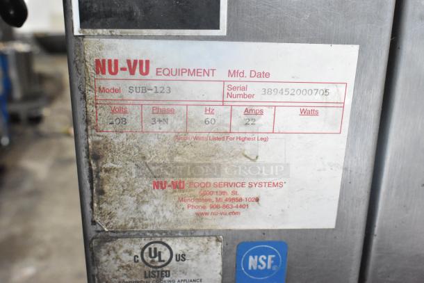 Nu Vu SUB-123 commercial oven proofer, stainless steel, 208V, 3 phase, on casters. Visible label with specs and serial number.