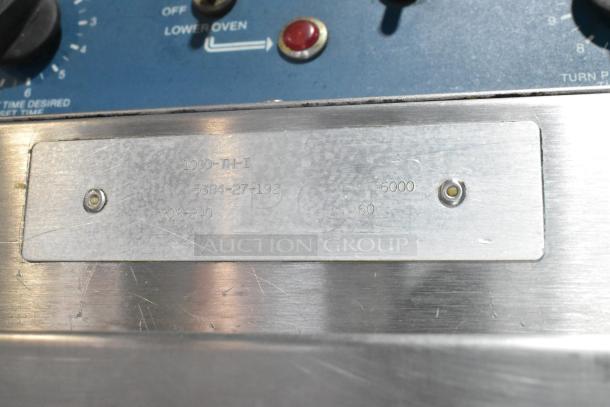 Alto Shaam 1000-TH-I stainless steel Cook N Hold oven, commercial casters; 208-240V, 1 Phase. Model plate visible.
