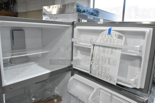 Brand new 2025 Whirlpool WRT311FZDM05 stainless steel cooler with freezer, 115 volts, 1 phase. Scratch and dent condition.