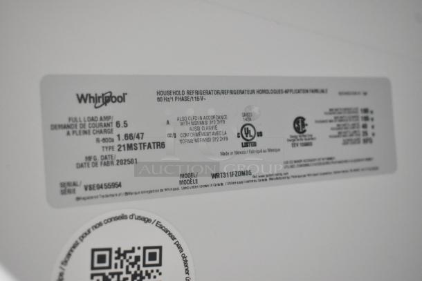 Label of a brand new Whirlpool WRT311FZDM05 stainless steel cooler with freezer, 115 volts, 1 phase.