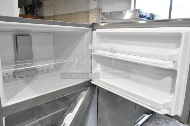 BRAND NEW SCRATCH AND DENT Whirlpool WRT311FZDM05 stainless steel cooler with freezer, 115V, 1 phase, open doors view.