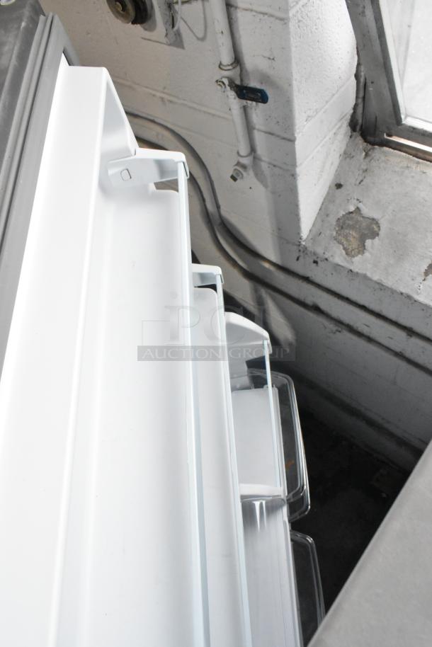 Brand new Whirlpool WRT311FZDM05 stainless steel cooler, scratch and dent. Features freezer, 115 volts, 1 phase.