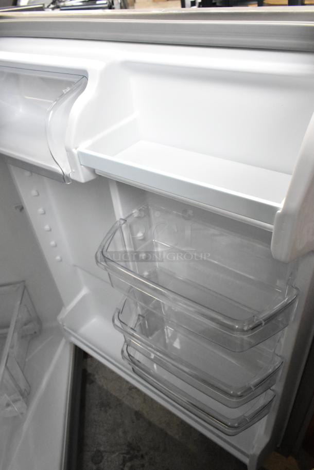 BRAND NEW Whirlpool WRT311FZDM05 stainless steel commercial cooler, scratch and dent. Features multiple clear shelves.