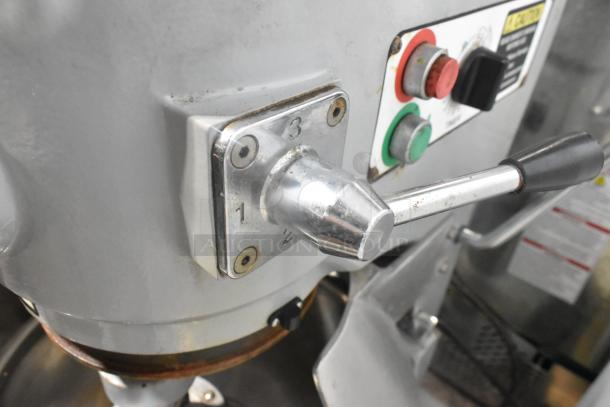 Centaur commercial planetary mixer with metal bowl and whisk, 208V, 1 phase. Features control panel with levers and buttons.