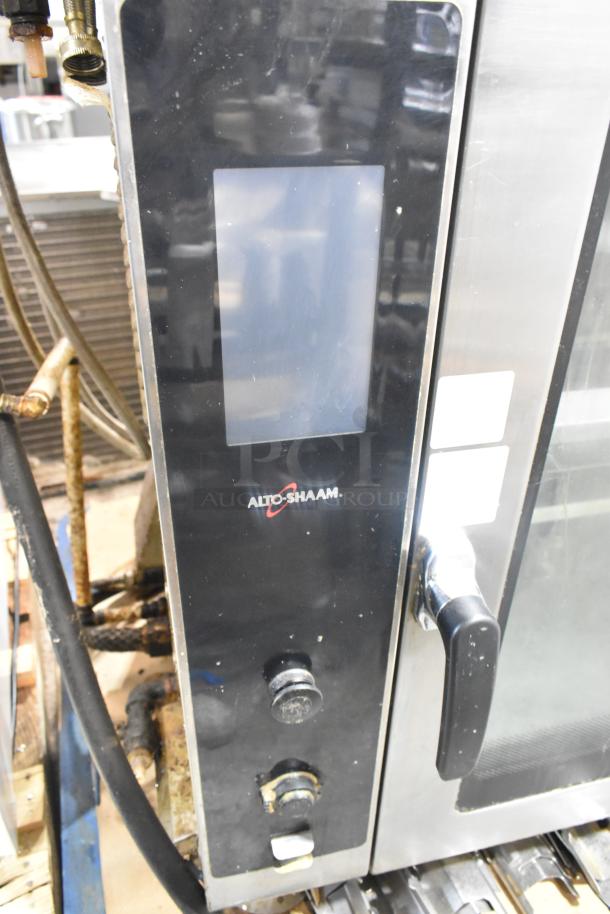 Alto Shaam AR-7T stainless steel electric rotisserie oven with self-cleaning feature, 7 spits, and 208 volts.