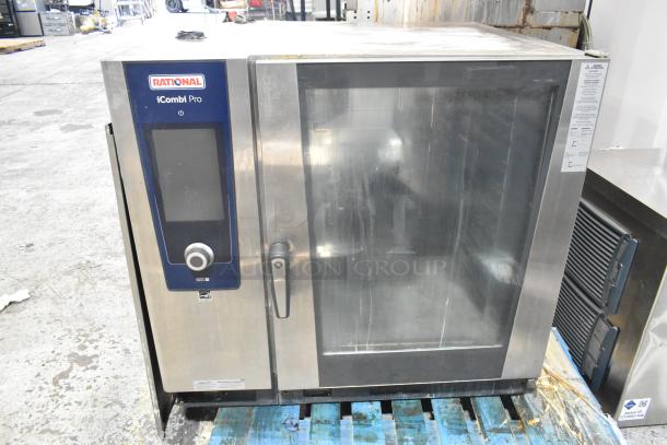 Rational LM100CE.AXXXX iCombi Pro stainless steel commercial convection oven, 440/480V, 1 phase. Visible wear on exterior.